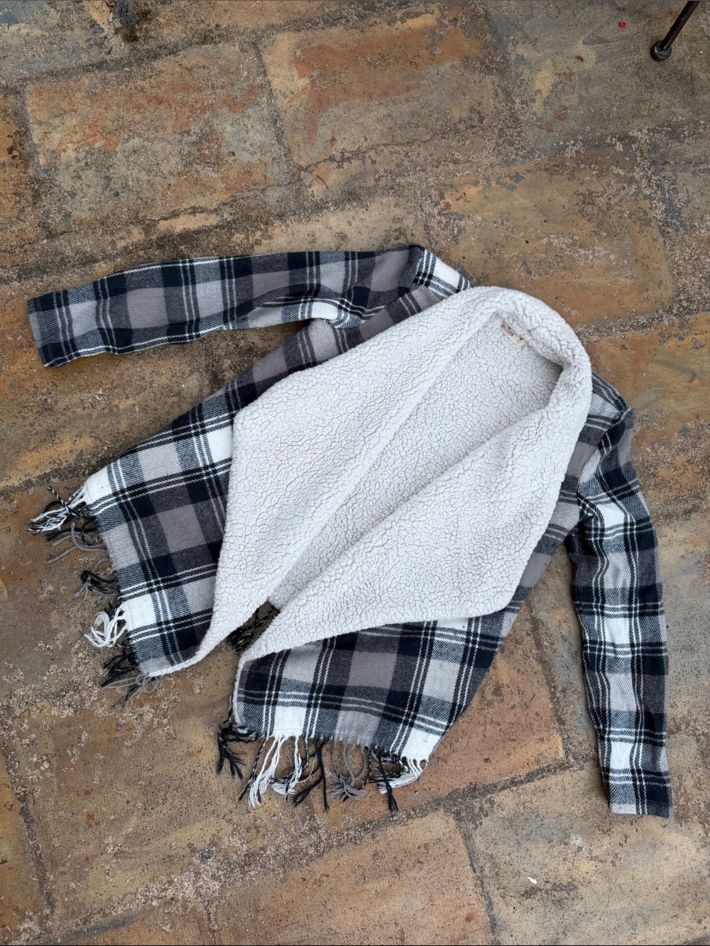 Holster Plaid Sherpa-Lined with plaid jacket. with fringe edges.